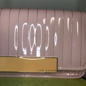 Ted Baker Pink Polyvinyl clutch. In Ted We Trust !